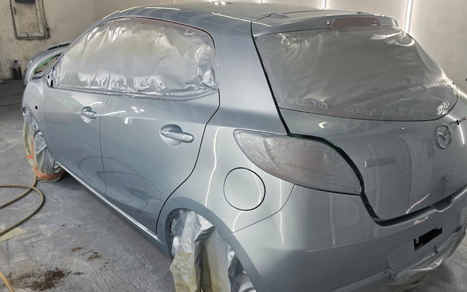 Mazda Demio — during repair
